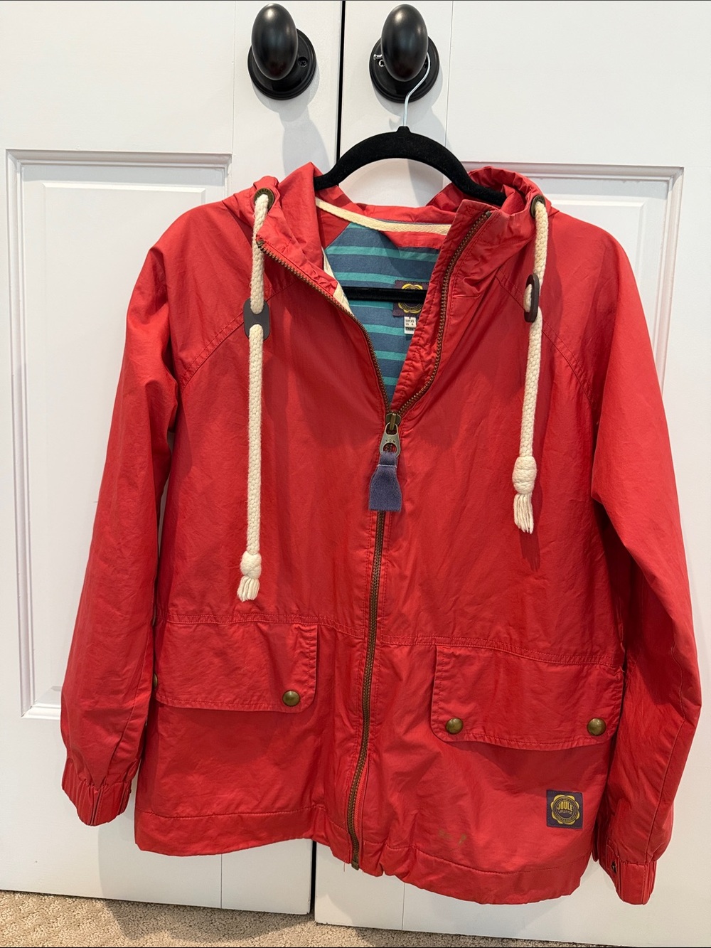 Joule Red Hooded rain jacket with Rope Drawstrings